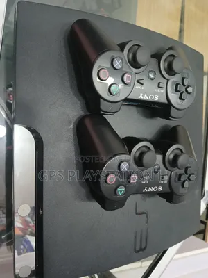 Photo - Playstation 3 Slim ገም የተጫነ