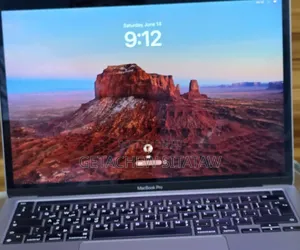 Photo - New Laptop Apple MacBook Pro 2022 M2 8GB Intel Core I9 SSD 256GB