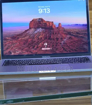 Photo - New Laptop Apple MacBook Pro M1 8GB Apple M2 SSD 256GB