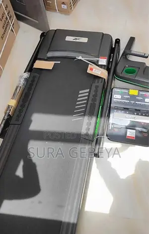 Photo - Sport Treadmills Fitness Workout በቤቶ ይስሩ