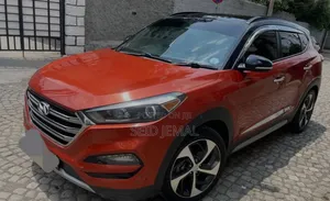 Photo - Hyundai Tucson 2017 Burgundy