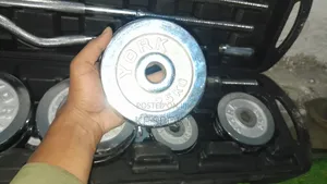 Adjustable Dumbbell Barbell and Kettlebell 3 in One