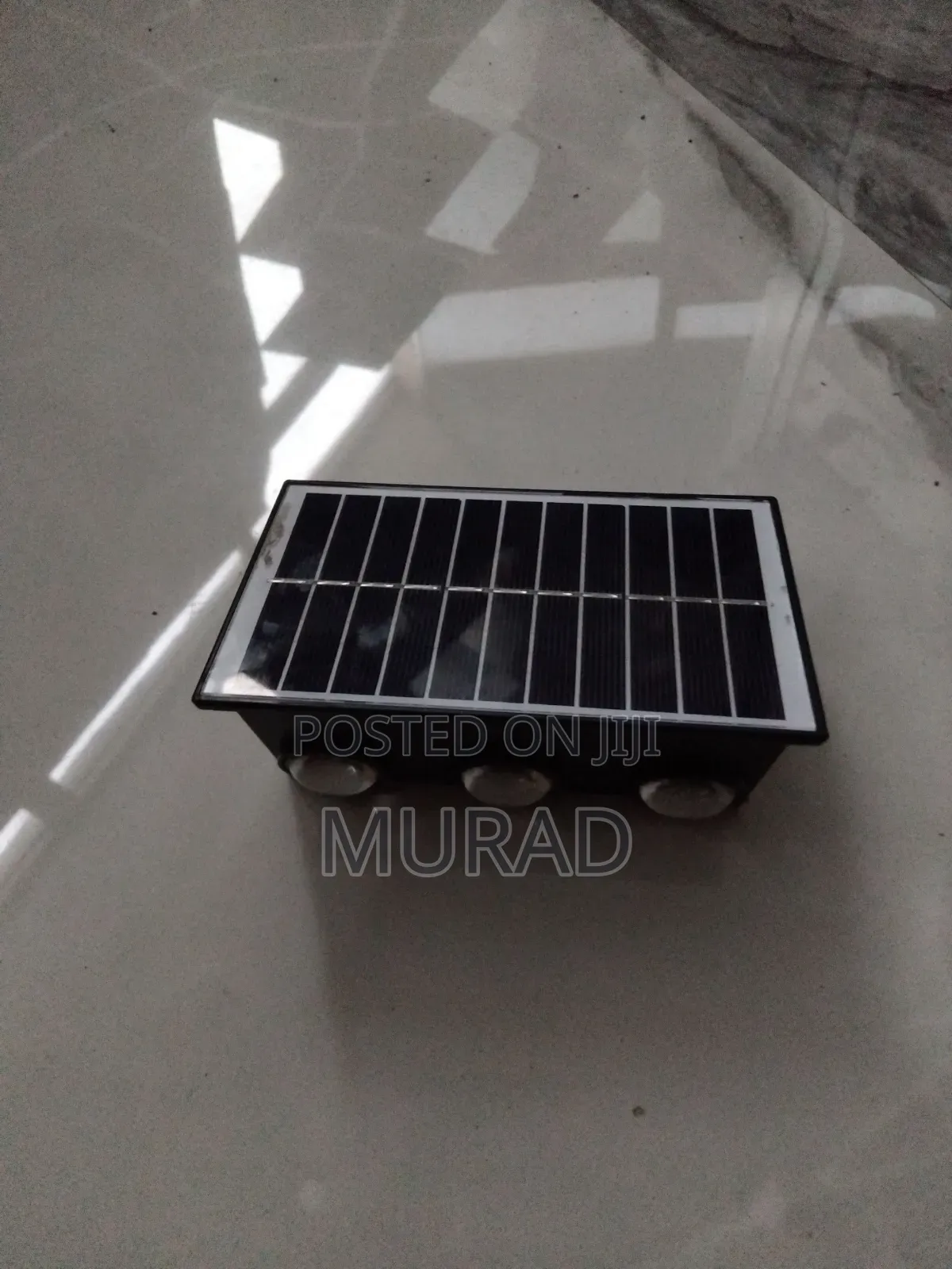 Solar JKF Wall Light