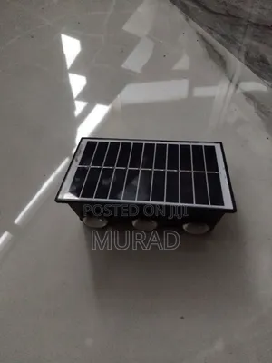 Photo - Solar JKF Wall Light