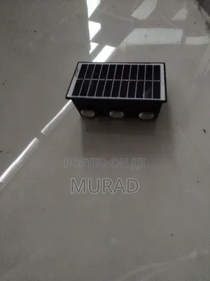 Solar JKF Wall Light