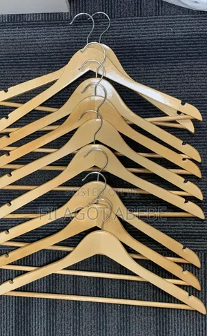 Photo - Solid Wood Suit Hanger. Imported 24pack Closit Hangers