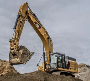 Photo - Excavator Cat Brand 330dl With Jackhammer