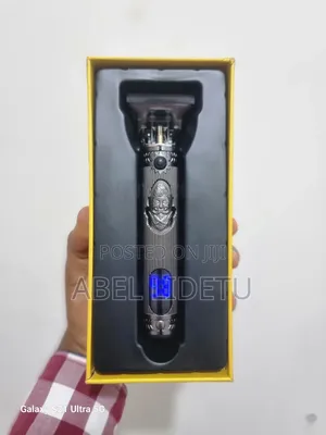 Photo - Kemei Metal Body Hair Trimmer