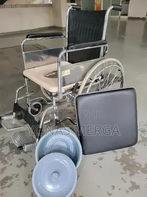 Photo - Toilet Wheelchair史مwilcherة业removable Seat and Toilet Bowl.