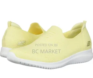Photo - Yellow Shoes Skechers