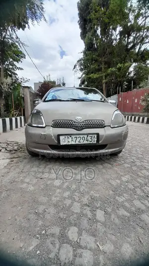 Photo - Toyota Vitz 1.0 FWD 5dr 2001 Brown