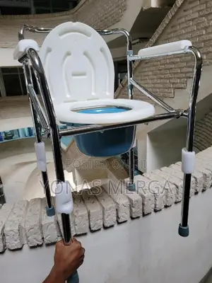 Photo - Toilet Chair塭ذ Drop-Arm Commodeا丹showering Can Be Safe