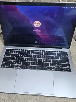 Photo - New Laptop Apple MacBook Pro 2017 16GB Apple M1 Pro SSD 256GB