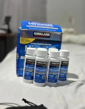 Photo - Minoxidil የፀጉር Hairgrowth Oil