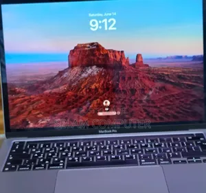 Photo - New Laptop Apple MacBook Pro 2022 M2 8GB Apple M2 SSD 256GB