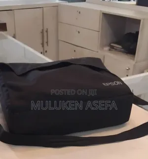 Photo - Brand New Epson Projector With Bag, Remote 
Model Name: