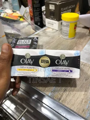 Photo - Olay Natural Day Night Aura Creamm