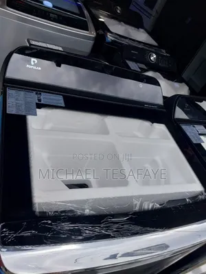 Photo - .G Poplar Top Load Washing Machine