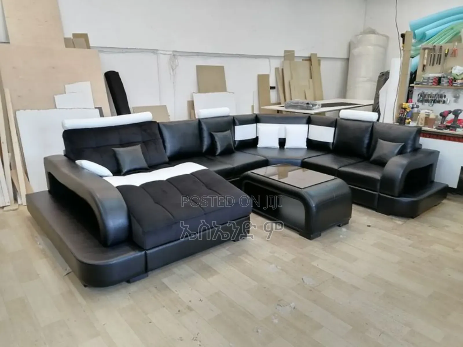 Sharp Black U Shaped Sofa With Table