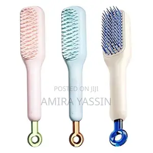 Photo - Retractable Cleaning Hair Brush