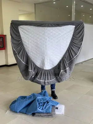 Photo - Waterproof Bed Cover