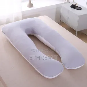 Photo - U Shape Maternity Pillow በእርግዝና ወቅት የመኝታ አለመመቸት ፡ 1