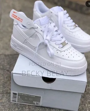 Photo - Nike Air Force 1 Low Triple White Shoes