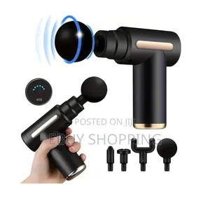 Photo - **Mini Massager Gun – Perfect For Shoulder, Back Leg Pain*