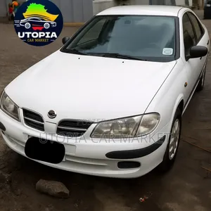 Photo - Nissan Sunny 2001 White