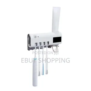 Photo - *Germ-Free Toothbrush Holder–Self-Sterilizing Wall-Mounted