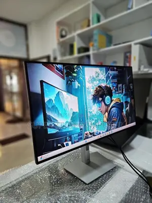 Photo - Dell 27 Inch Resolution Full Silver Color Frameless Mon