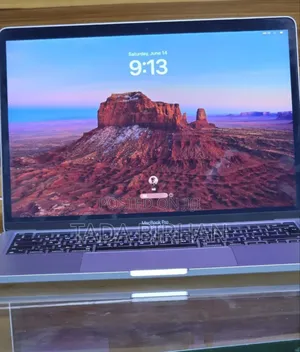 Photo - New Laptop Apple MacBook Pro 2022 M2 8GB Intel Core M2 SSD 512GB