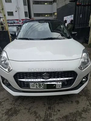Photo - Suzuki Swift 2022 White