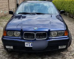 Photo - BMW 320i Sedan RWD 1998 Blue