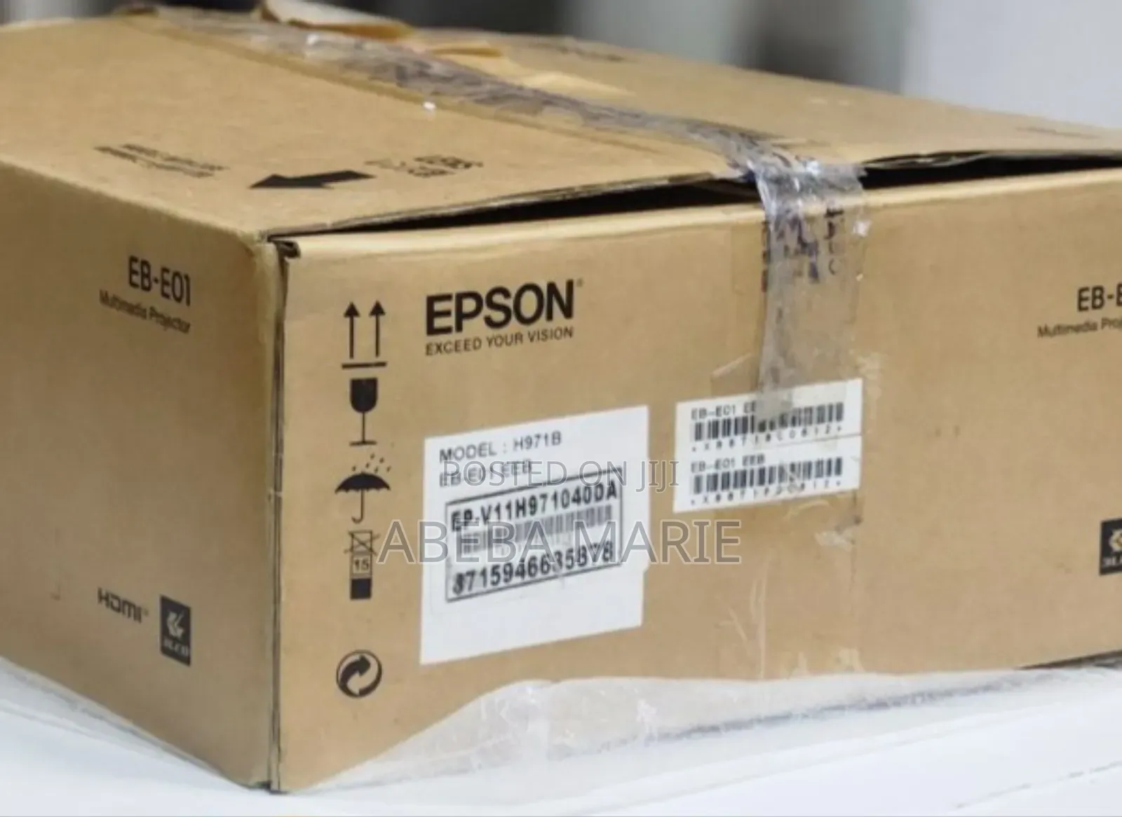 Epson Projector Brand New 
With Cartoon 
Model Name: E