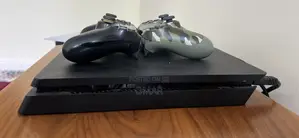 Ps4 Slim With Two Controllers and 4 Games
