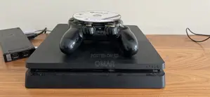 Ps4 Slim With Two Controllers and 4 Games