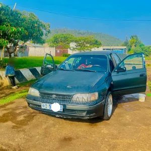 Photo - Toyota Carina E 1.6 Sedan 1995 Blue