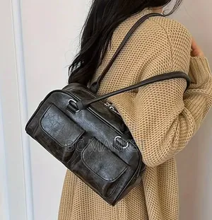 Photo - Front Pocket Sling Bag