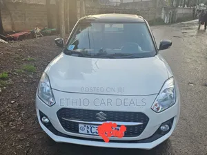 Photo - Suzuki Swift 2022 White