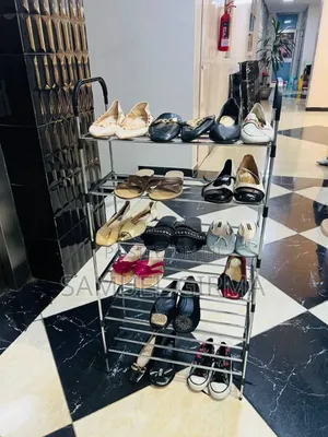 Photo - ከብረት የተሰራ
ጫማ እና የተለያዩ ዕቃወች ማስቀመጫ