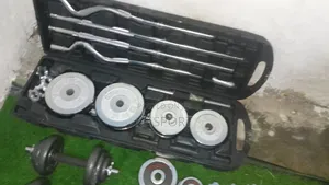 Photo - ክረማትን በስፖርት ያሳልፉ( ተገጣጣሚ ዳምፔልና ባርቤል)