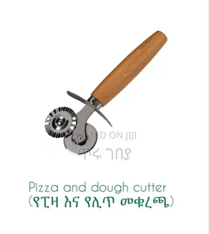 Photo - Pizza And Dough Wheel Cutter የፒዛ እና የሊጥ መቁረጯ