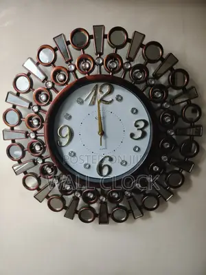 ቆንጆ የግድግዳ ስዓት