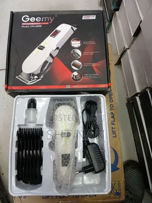 Photo - -ጂሚ በቻርጀ የሚሰራ የፁጉር መቁረጫ Geemy Professional Hair Clipper