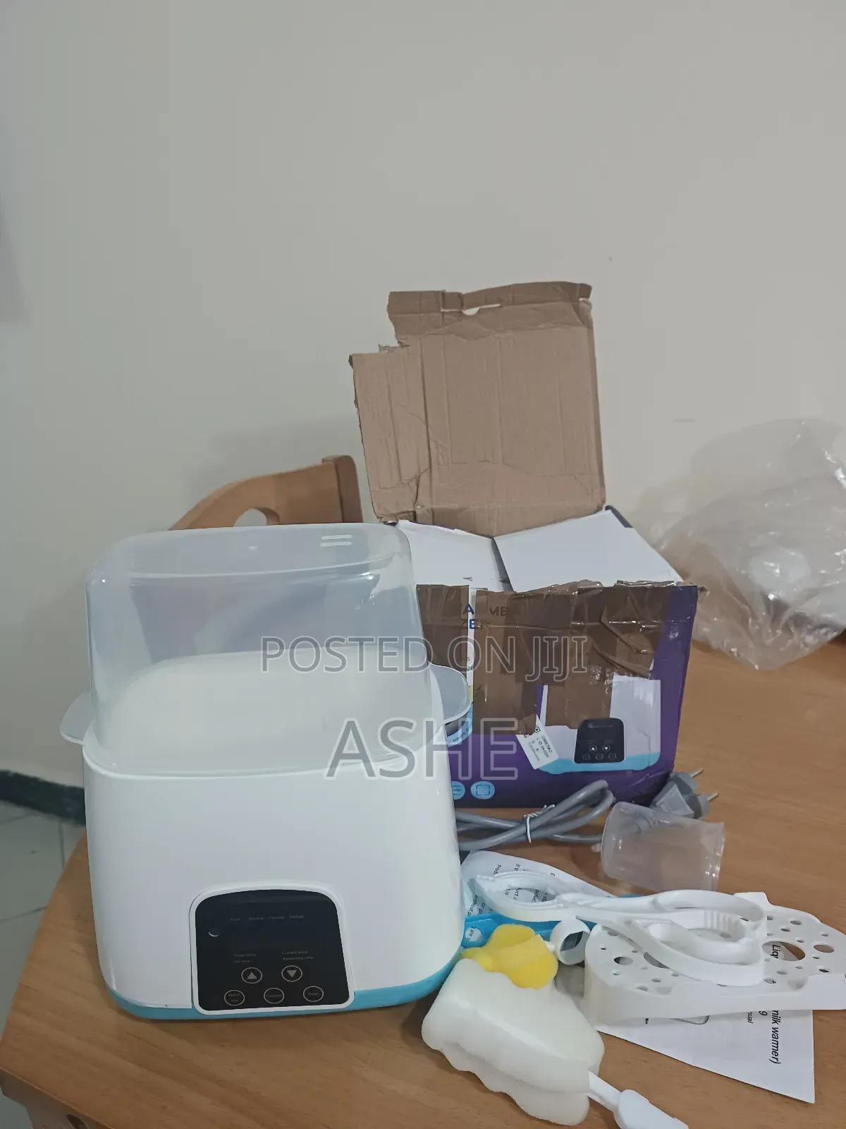 የወተት ማሞቂያ እና ጡጦ መቀቀያ Bottle Sterilizer and Milk Warmer