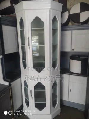 Photo - ባለ 5 መደርደሪያ ኮርነር ብፌ