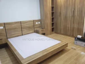 Photo - Bed With Night Stand