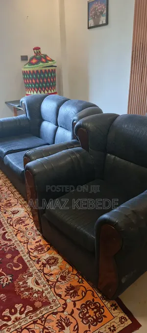 Photo - Black 7 Seat Sofa