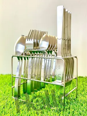 Photo - ማንኪያ ሹካ እንዲሁም ቢላዋ የያዘ